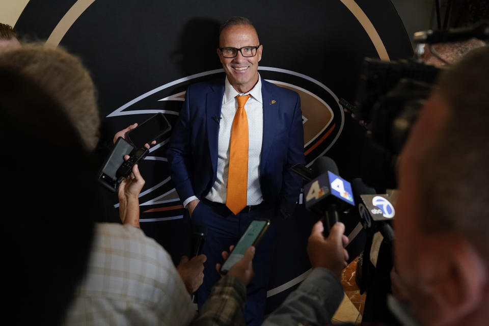 Greg Cronin speaks to reporters during a press conference announcing him as the new head coach of the Anaheim Ducks in Anaheim, Calif., Monday, June 5, 2023. (AP Photo/Ashley Landis)