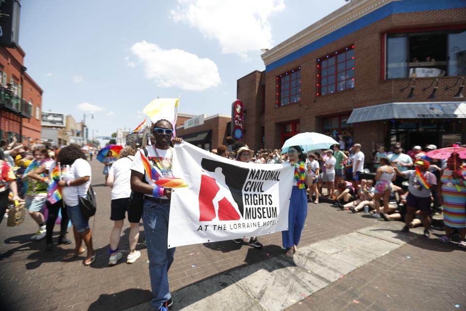National Civil Rights Museum representatives march in the Memphis Pride Parade on Saturday, June 3, 2023, on Beale Street in Memphis, Tenn.