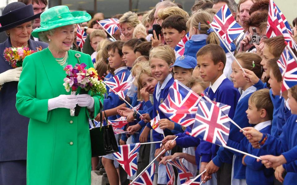 <p>One thing is for sure, wearing green always makes The Queen look very vibrant. [Photo: Getty] </p>