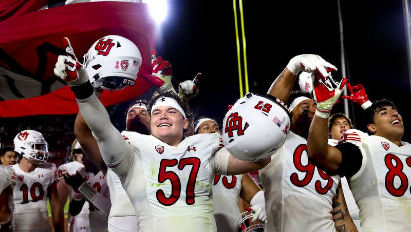 The Utes celebrate their 34-32 win against the USC Trojans at the Los Angeles Memorial Coliseum on Saturday, Oct. 21, 2023.