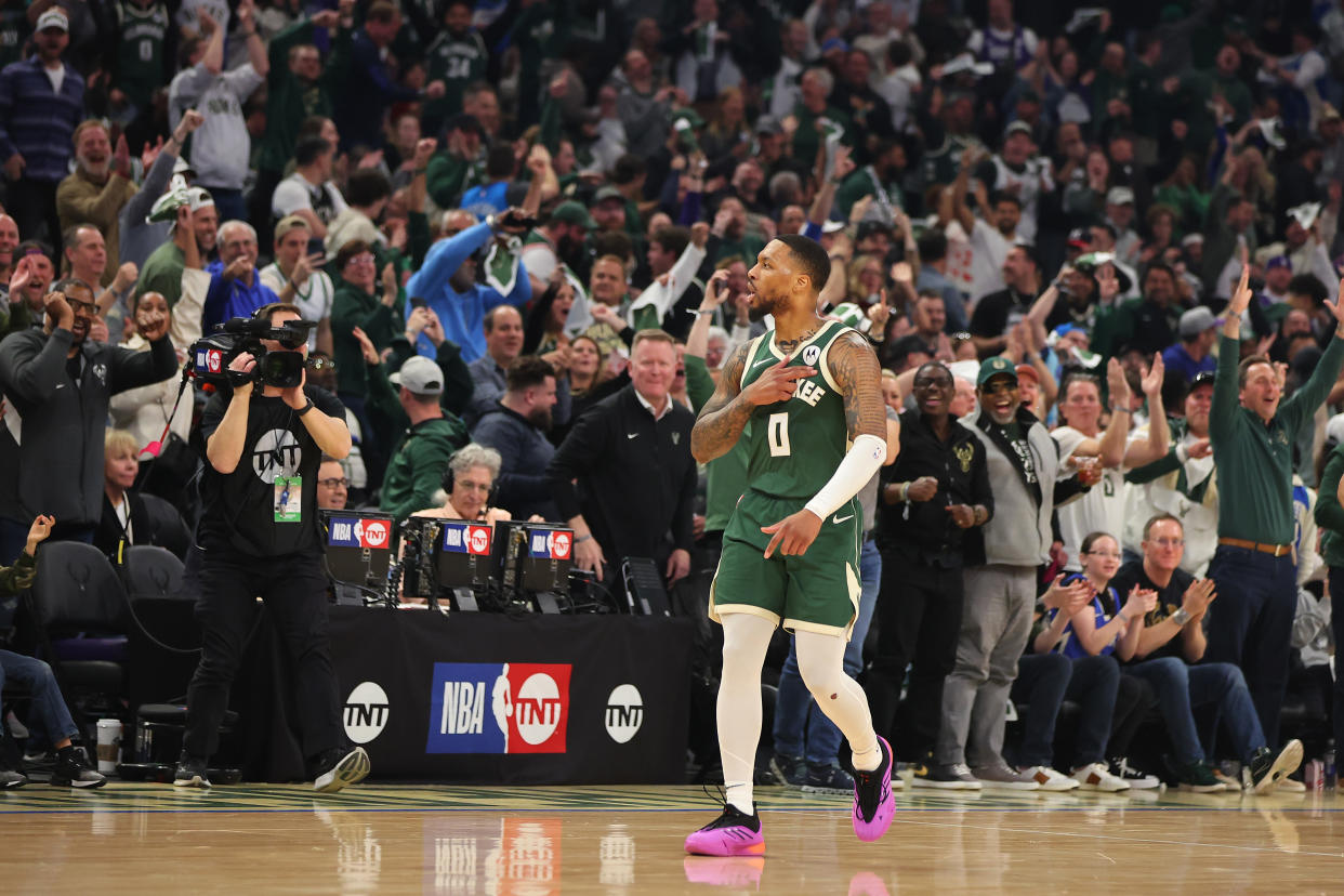 MILWAUKEE, WISCONSIN - APRIL 21: Damian Lillard #0 of the Milwaukee Bucks reacts to a three point shot during the first half of game one of the Eastern Conference First Round Playoffs against the Indiana Pacers at Fiserv Forum on April 21, 2024 in Milwaukee, Wisconsin.  NOTE TO USER: User expressly acknowledges and agrees that, by downloading and or using this photograph, User is consenting to the terms and conditions of the Getty Images License Agreement. (Photo by Stacy Revere/Getty Images)