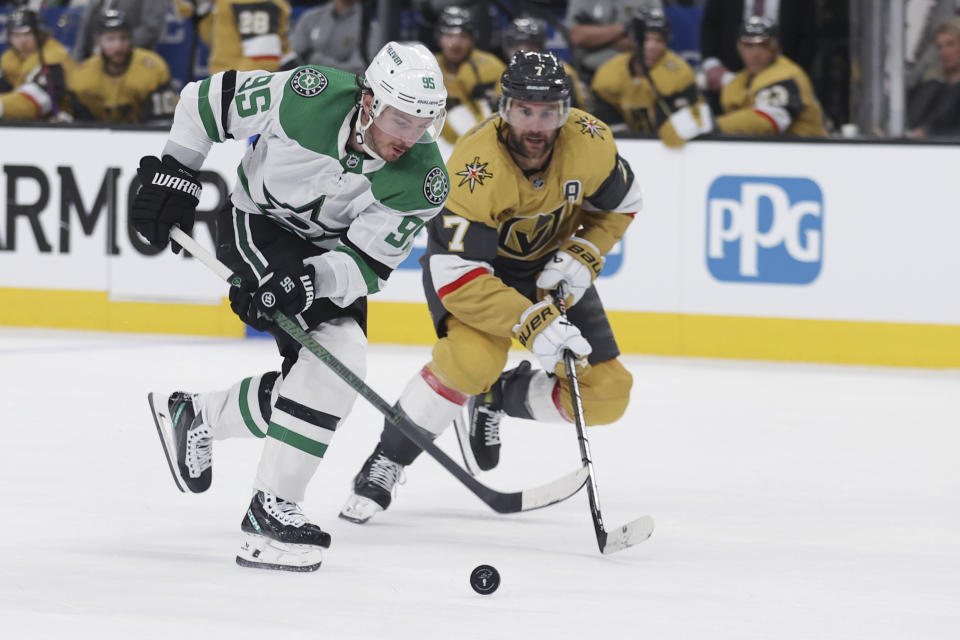 Dallas Stars center Matt Duchene (95) skates past Vegas Golden Knights defenseman Alex Pietrangelo (7) during the first period in Game 3 of an NHL hockey Stanley Cup first-round playoff series Saturday, April 27, 2024, in Las Vegas. (AP Photo/Ian Maule)