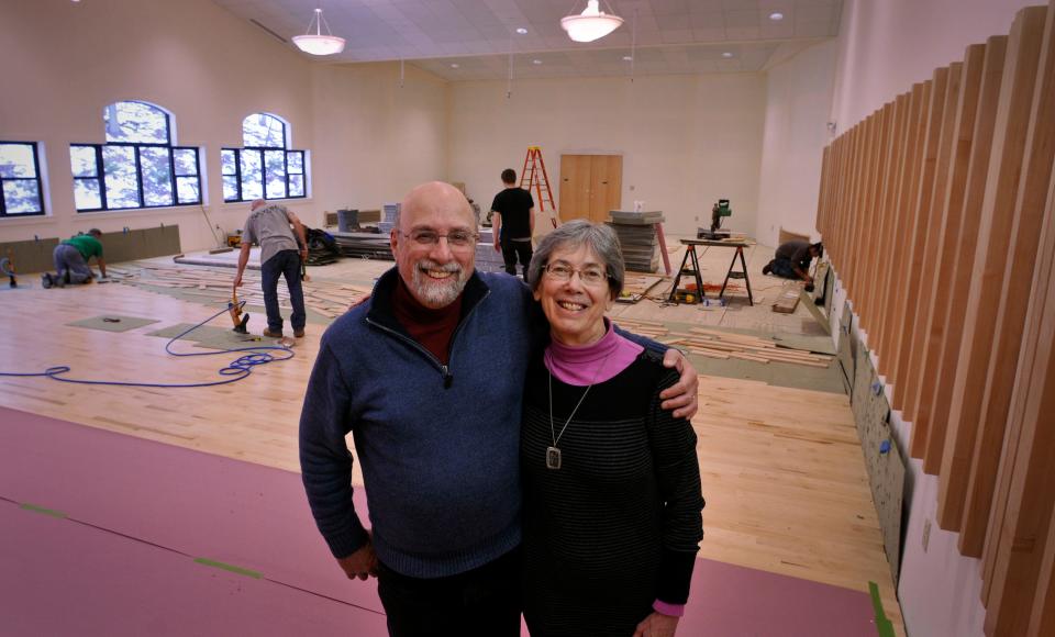 Wendy and Richard Ardizzone, then director and associate director of the Joy of Music Program, are pictured in JOMP's auditorium as it neared completion on Jan. 14, 2016.