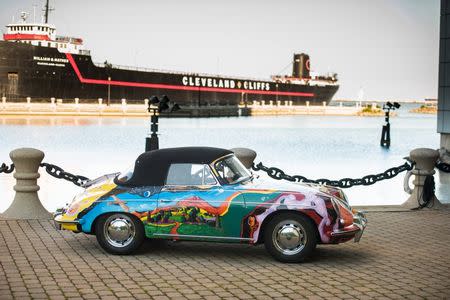 A psychedelically painted 1965 Porsche 365C 1600 Cabriolet once owned by legendary singer Janis Joplin is seen in an undated handout picture courtesy of RM Sotheby's taken outside the Rock and Roll Hall of Fame in Cleveland, Ohio. REUTERS/Courtesy of RM Sotheby's/Darin Schnabel/Handout via Reuters