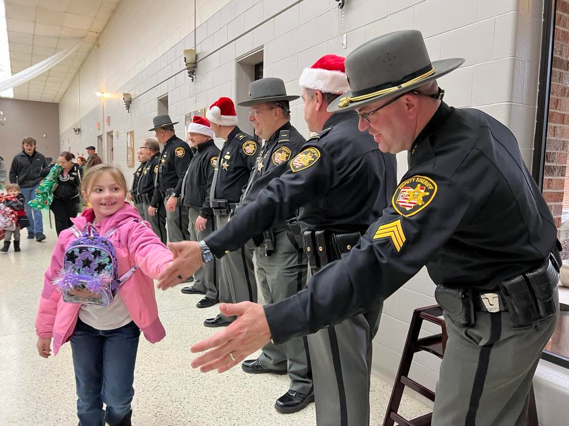 Shop with the Sheriff was at St. George Romanian Byzantine Catholic Cathedral on Saturday. The Stark County Sheriff's Office, with the support of the Sheriff's Office Wives Committee, provided Christmas gifts for 35 children.