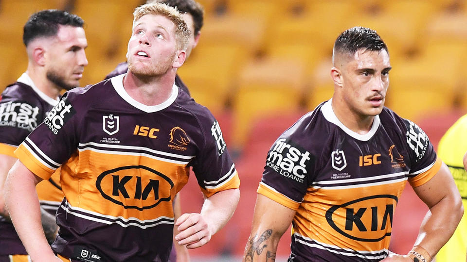 Brisbane Broncos players are pictured during their loss to Parramatta in the NRL's return.