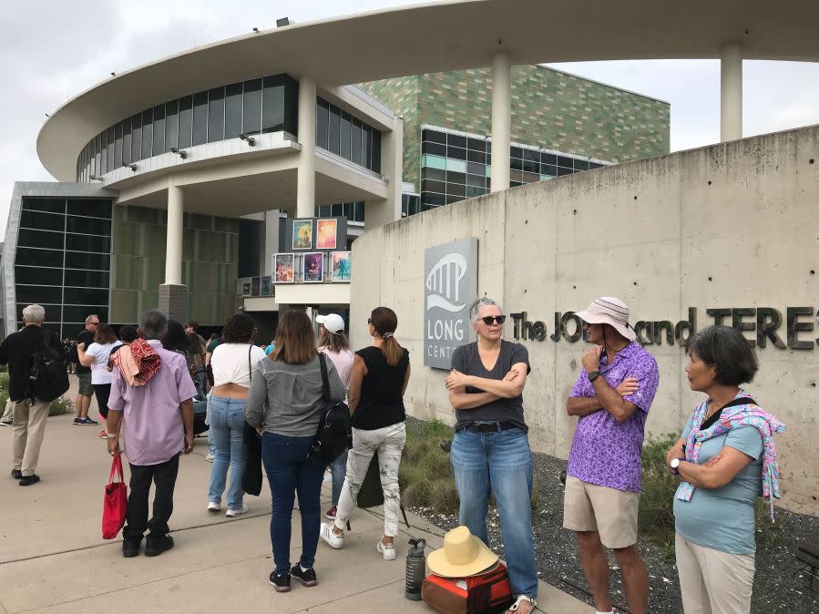 Lines at the Long Center started forming before 10 a.m. for an 11 a.m. entrance to view the eclipse on the front lawn. (KXAN Photo/Ed Zavala)