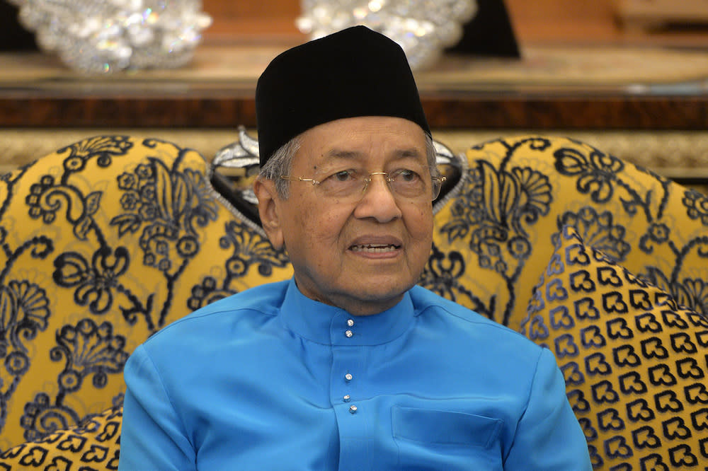 Prime Minister Tun Dr Mahathir Mohamad speaks to reporters during his Hari Raya Open House at Seri Perdana in Putrajaya June 5, 2019. — Picture by Mukhriz Hazim