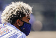 New York Mets shortstop Francisco Lindor stands in the dugout during the first inning of a baseball game against the Miami Marlins, Thursday, April 8, 2021, in New York. (AP Photo/John Minchillo)