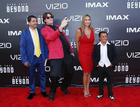 Actor Deep Roy (R) and guests arrive for the world premiere of "Star Trek Beyond" at Comic Con in San Diego, California U.S., July 20, 2016. REUTERS/Mike Blake