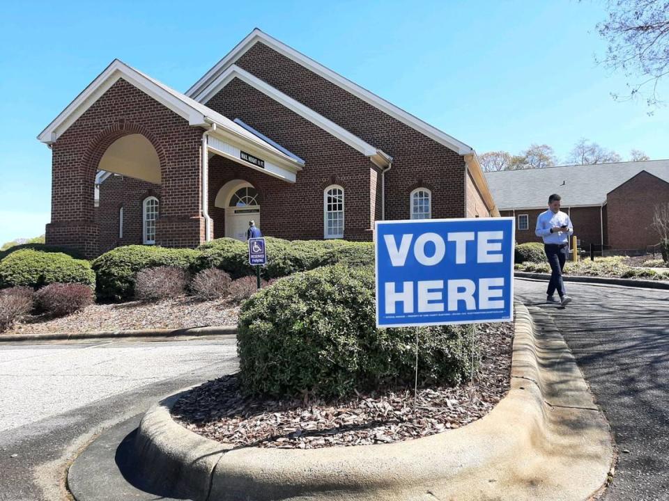Voters walk in and out of a precinct at Unity Presbyterian Church in Fort Mill in March. York and Lancaster county council seats will be decided in Republican primaries in June.