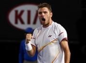 Stanislas Wawrinka of Switzerland celebrates winning the third set in his men's singles semi-final match against Tomas Berdych of the Czech Republic at the Australian Open 2014 tennis tournament in Melbourne January 23, 2014. REUTERS/Petar Kujundzic