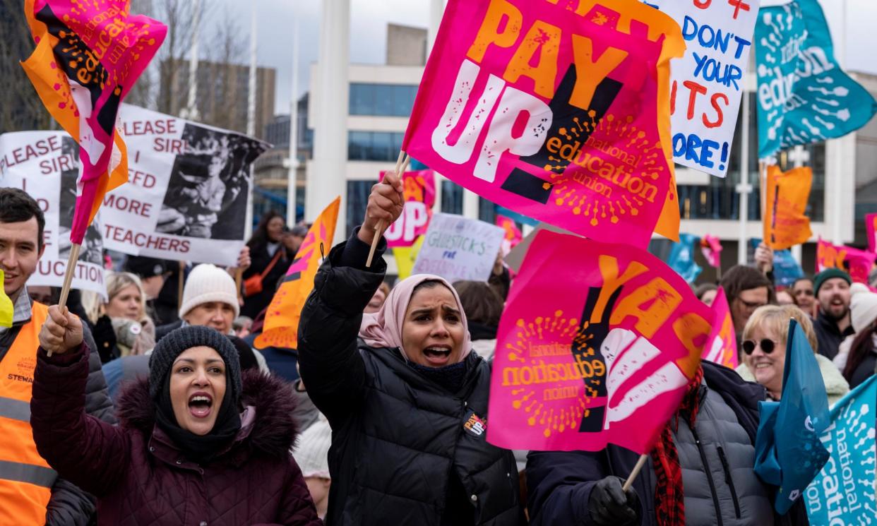 <span>A National Education Union strike action rally in Birmingham last year.</span><span>Photograph: Mike Kemp/In Pictures/Getty Images</span>