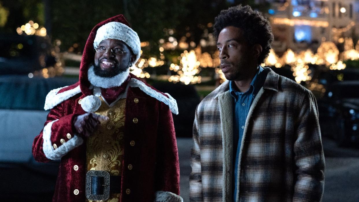  Lil Rel Howery and Chris "Ludacris" Bridges in Dashing Through the Snow. 