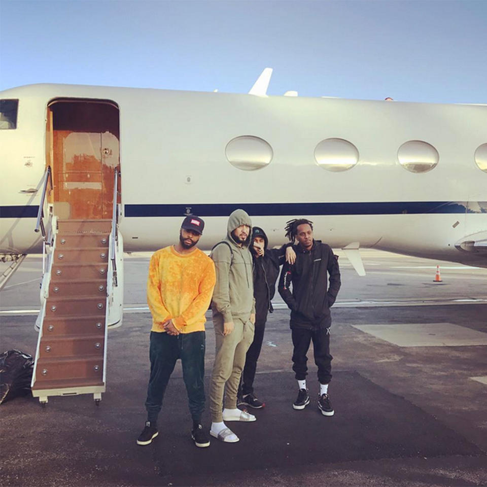 <p><span>The Weeknd</span> prepares for take off with a quick group photo in front of a private jet.</p>