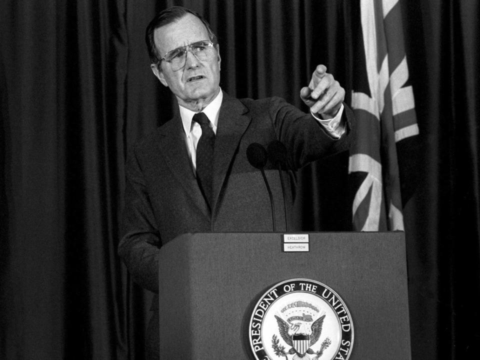 George HW Bush, then US vice president, at a press conference in London in 1984 (PA)