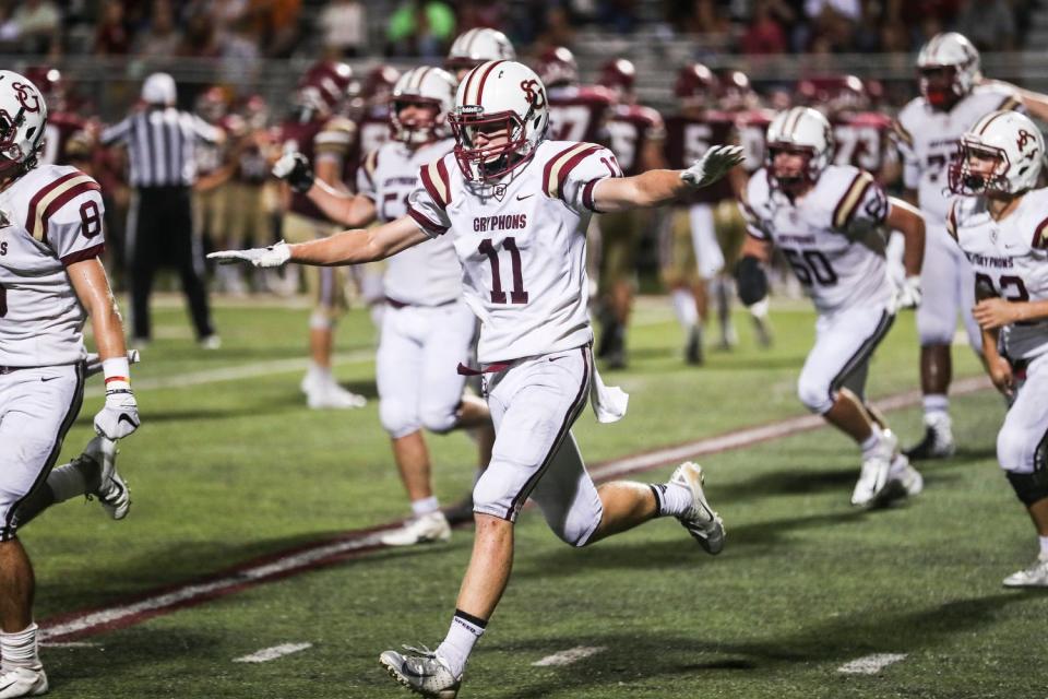 September 07 2018 - St. George's Wes Smith, 11, runs off the field after a missed field goal attempt by Evangelical Christian School during Friday night's game.