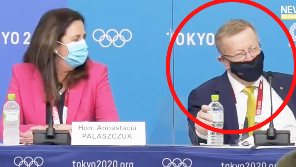 AOC president John Coates (pictured right) talking about Queensland Premier Annastacia Palaszczuk (pictured left) who seems shocked at his words in Tokyo.