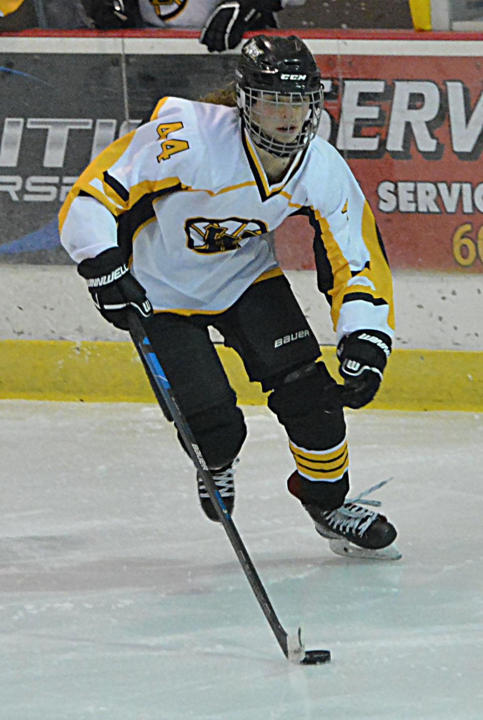 Emma Schleusner of the Watertown Lakers handles the puck during a South Dakota Amateur Hockey Association varsity girls game on Friday, Nov. 23, 2023 in the Maas Ice Arena.