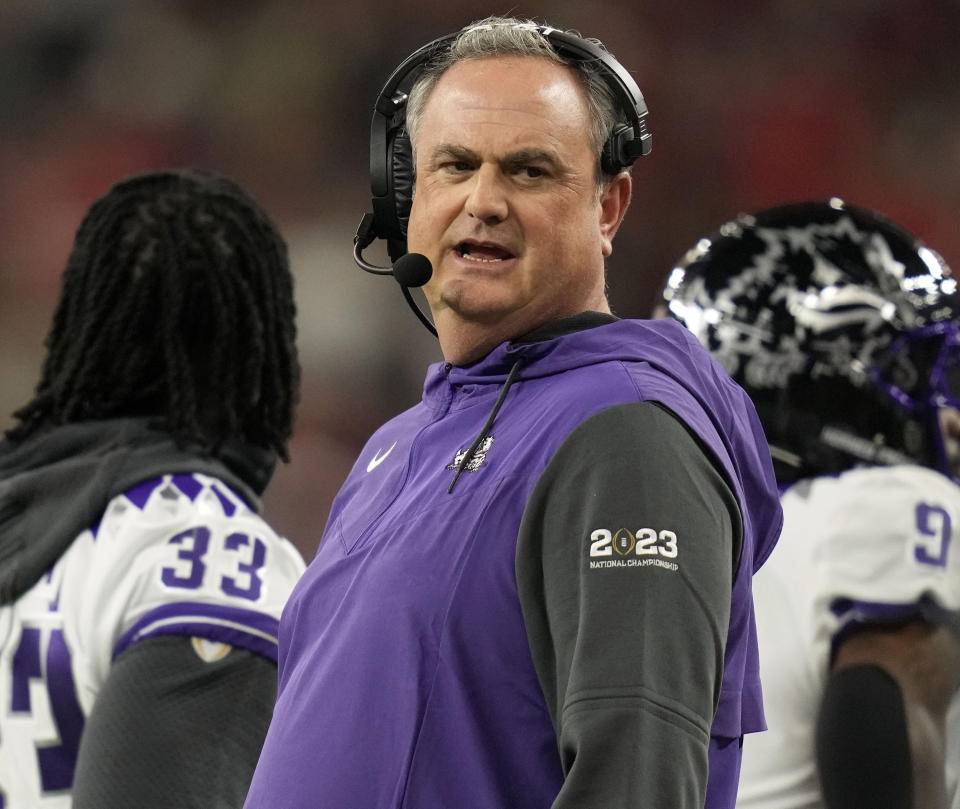 FILE - TCU head coach Sonny Dykes watches play against Georgia during the first half of the national championship NCAA College Football Playoff game Jan. 9, 2023, in Inglewood, Calif. TCU had an undefeated regular season in Dykes’ first season, and still made the four-team College Football Playoff after losing in overtime to Kansas State in the Big 12 title game. (AP Photo/Ashley Landis, File)