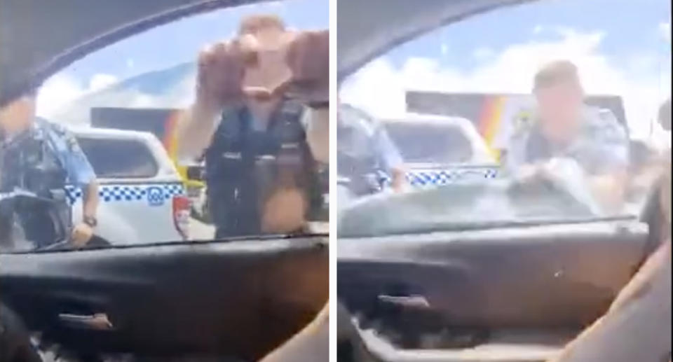 The NSW police officer tugging at the window. 