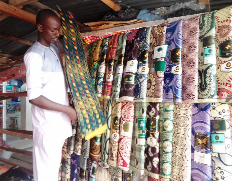 Nigerian textile dyers fear a Chinese takeover of their trade that threatens to put 30,000 artisans out of business