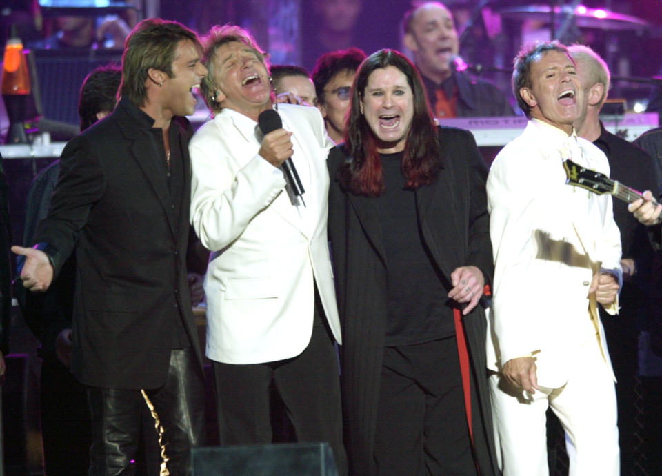 (Left to right) Ricky Martin, Rod Stewart, Ozzy Osbourne and Cliff Richard on stage during the Golden Jubilee concert at Buckingham Palace.