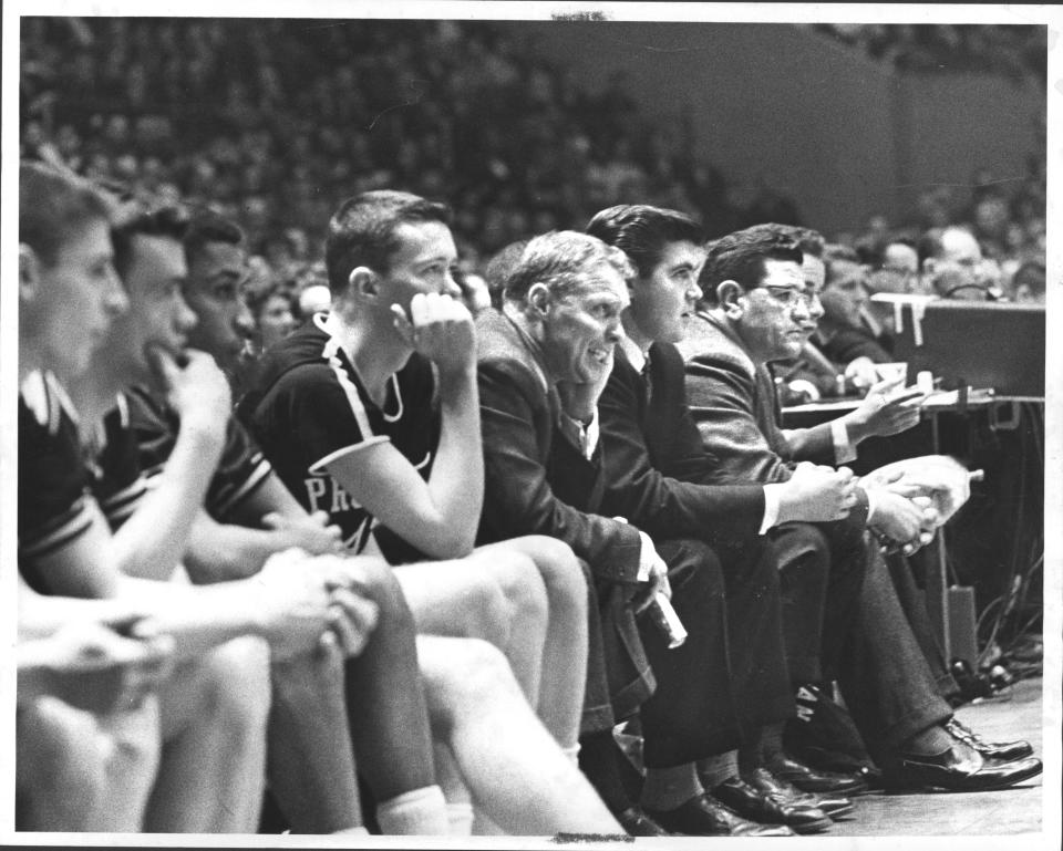 PC coach Joe Mullaney, center, at the N.I.T championship game in 1961.