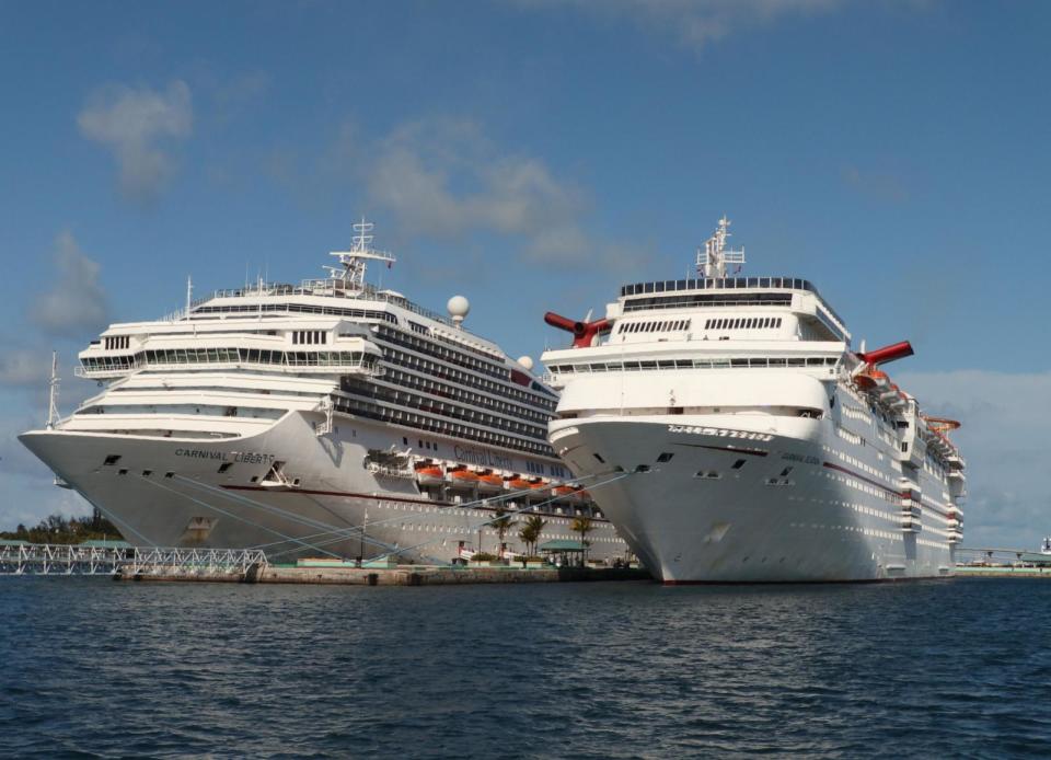 PHOTO: Carnival Cruise ships Liberty and Elation are seen in Nassau, Bahamas, April 29, 2019.  (Daniel Slim/AFP via Getty Images/FILE)