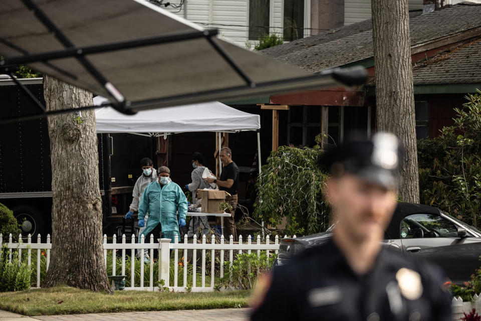 Crime laboratory officers search the home Rex Heuermann in Massapequa Park, New York on July 18, 2023. (Yuki Iwamura / AFP via Getty Images)