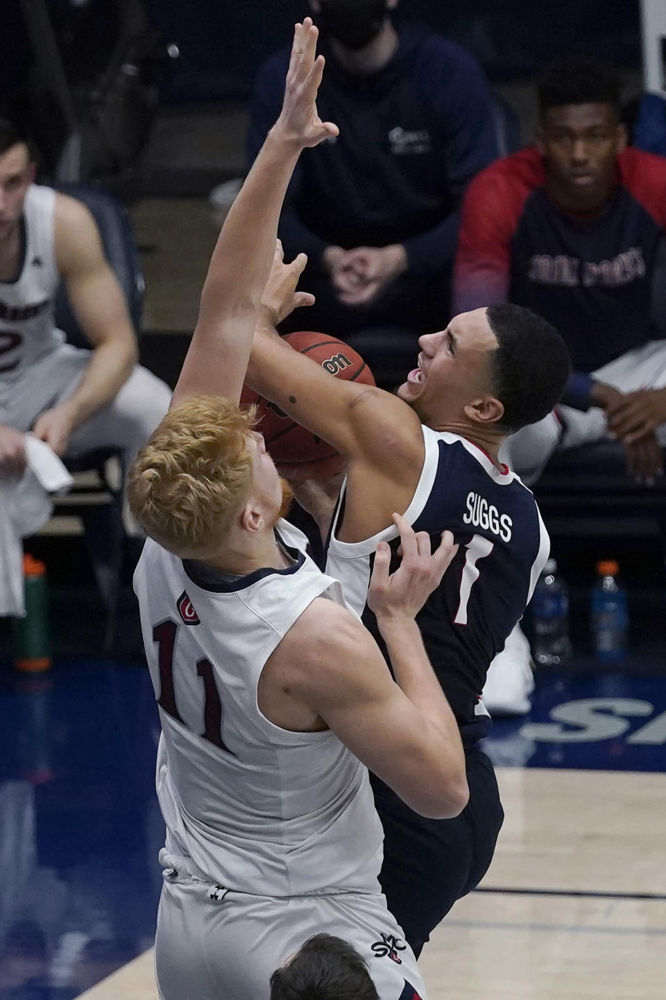 Gonzaga guard Jalen Suggs (1) shoots against Saint Mary's forward Matthias Tass (11) during the first half of an NCAA college basketball game in Moraga, Calif., Saturday, Jan. 16, 2021. (AP Photo/Jeff Chiu)