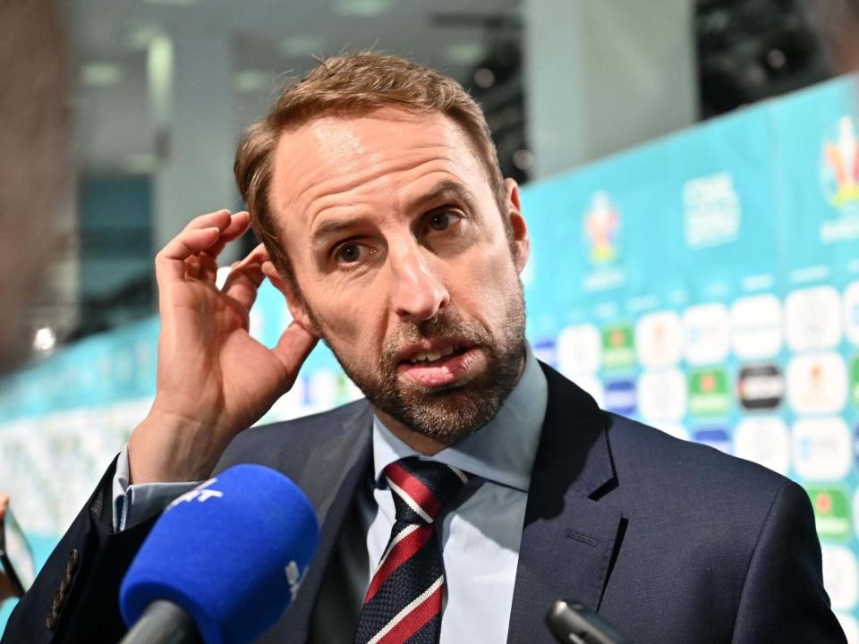 England manager Gareth Southgate speaks to the media at the draw: Getty