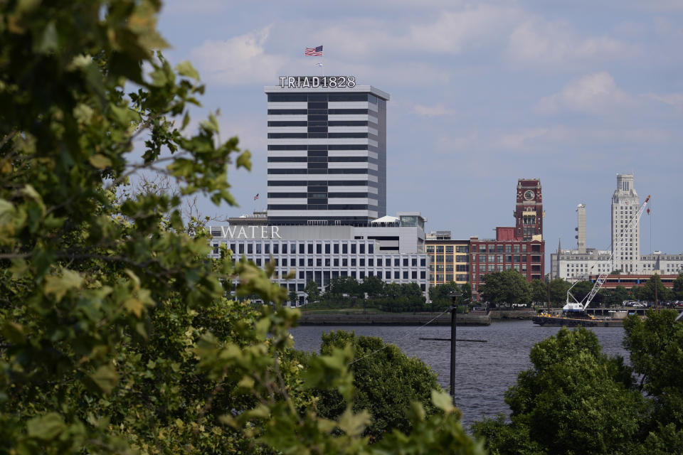 The Triad1828 building is seen on the Camden, N.J. skyline, Monday, June 17, 2024, photographed from across the Delaware River in Philadelphia. (AP Photo/Matt Slocum)