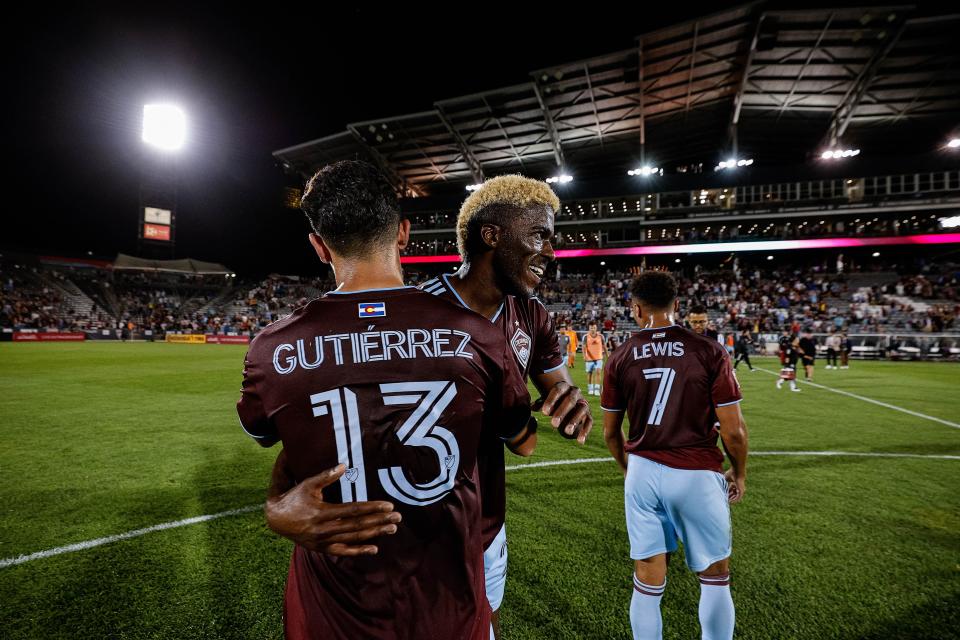 Not even a year ago, Gyasi Zardes, center, was a Colorado Rapids forward celebrating with teammate Felipe Gutiérrez after an August home match. Fast forward six months, and Zardes is readying to make his debut with Austin FC.