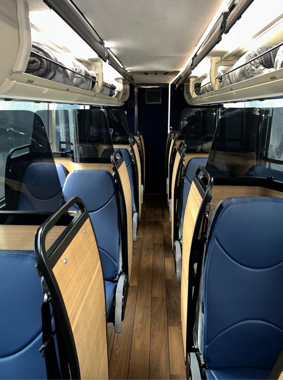 blue seats in cubbies on napaway bus