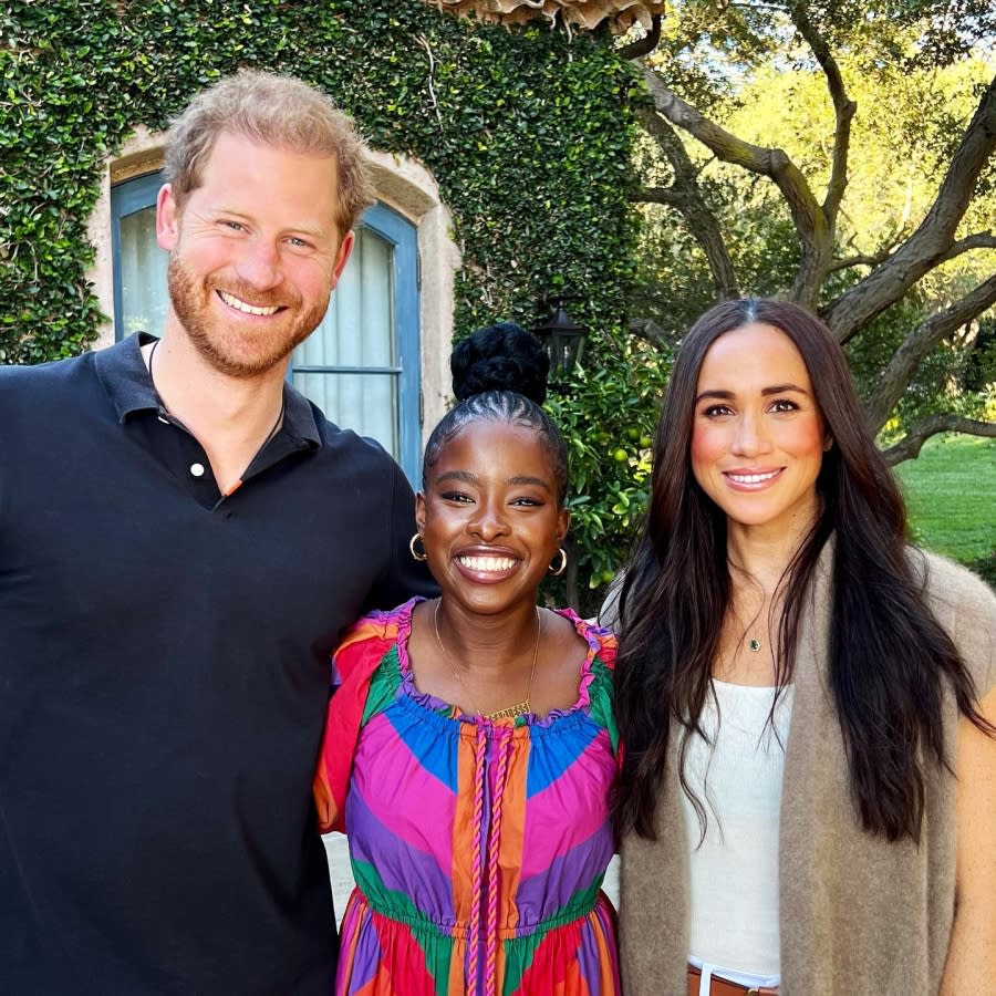 Prince Harry and Meghan Markle Pose for Rare Photo With Poet Amanda Gorman