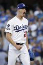 Los Angeles Dodgers starting pitcher Walker Buehler reacts after striking out Washington Nationals' Anthony Rendon to end the top of the first inning of Game 1 in baseball's National League Divisional Series on Thursday, Oct. 3, 2019, in Los Angeles. (AP Photo/Marcio Jose Sanchez)