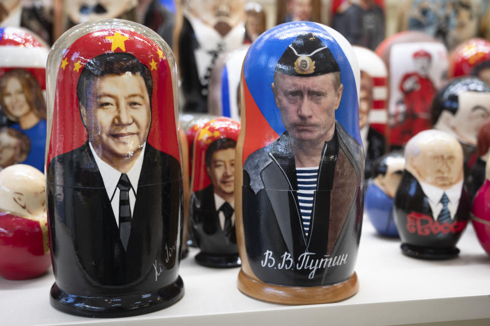 FILE - Russian matryoshka dolls with portraits of Chinese President Xi Jinping, left, and Russian President Vladimir Putin are displayed among others for sale at a souvenir shop in Moscow, Russia, on March 21, 2023. The EU is particularly disturbed by President Vladimir Putin’s plans to deploy tactical nuclear weapons to Belarus. That announcement was made just days after Xi and Putin met to cement their “no-limits friendship.” (AP Photo/Dmitry Serebryakov, File)