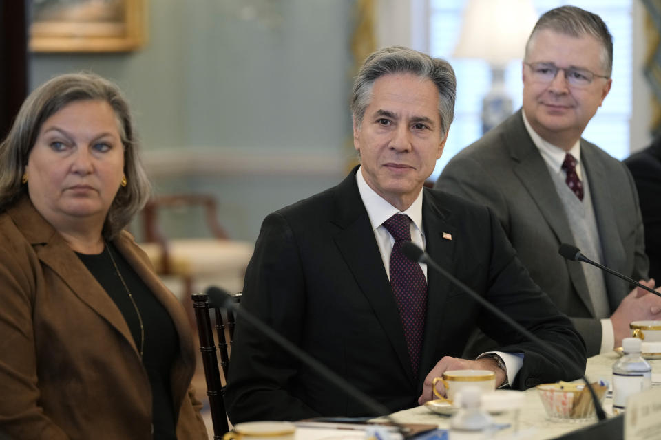 Secretary of State Antony Blinken, center, during a meeting with People's Republic of China CCP International Liaison Department Minister Liu Jianchao at the State Department in Washington, Friday, Jan. 12, 2024. (AP Photo/Susan Walsh)