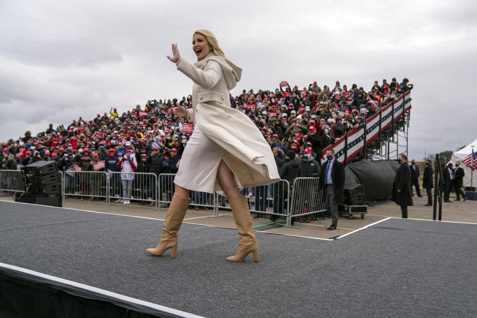 Ivanka Trump walks onstage to introduce her father, President Donald Trump at a campaign rally at Michigan Sports Stars Park, Sunday, Nov. 1, 2020, in Washington, Mich. (AP Photo/Evan Vucci)