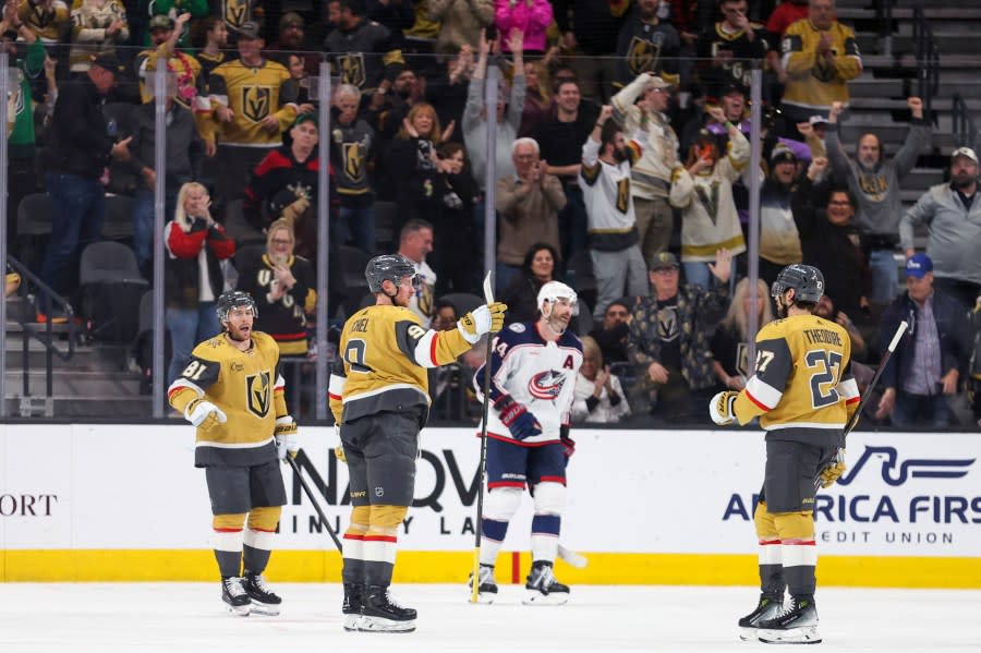Vegas Golden Knights center Jack Eichel (9) celebrates his goal against the Columbus Blue Jackets during the third period of an NHL hockey game Saturday, March 23, 2024, in Las Vegas. (AP Photo/Ian Maule)