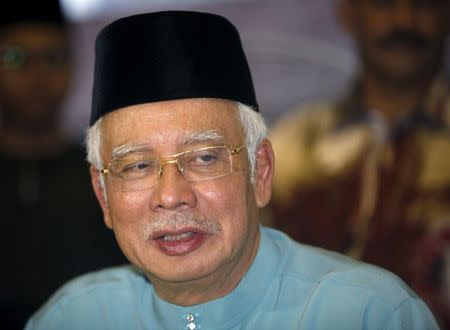 Malaysia's Prime Minister Najib Razak arrives to break fast at Saujana Menteri Besar in Malaysia's southern state of Johor July 3, 2015. REUTERS/Edgar Su