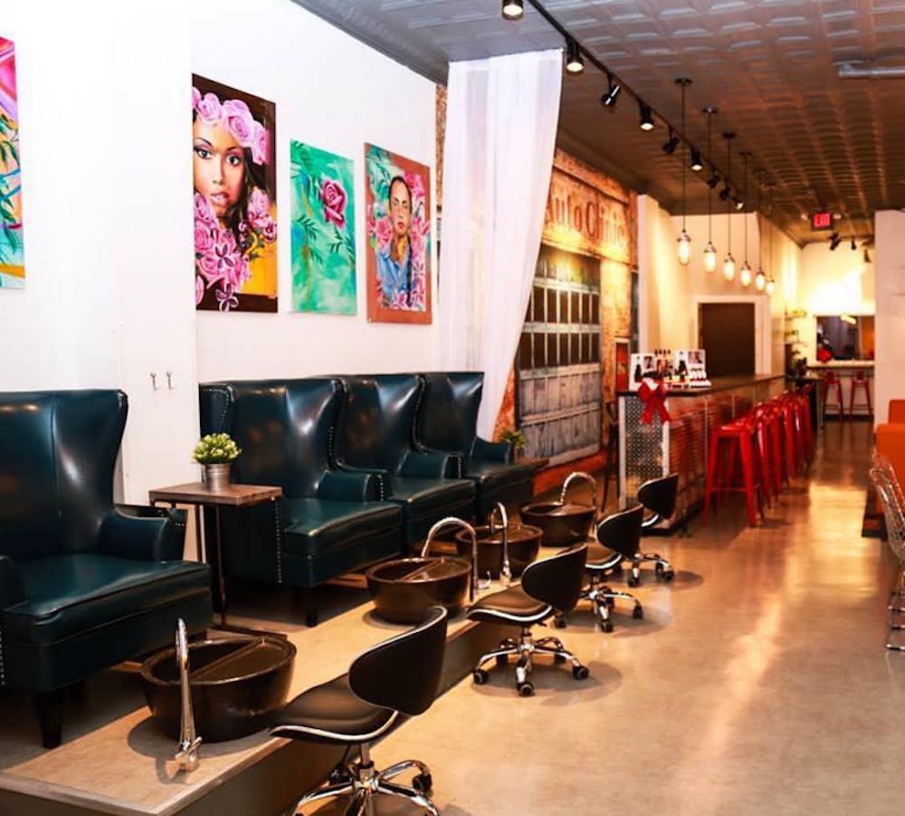 You can get your hair and nails done when you get an oil change at this all-female auto shop