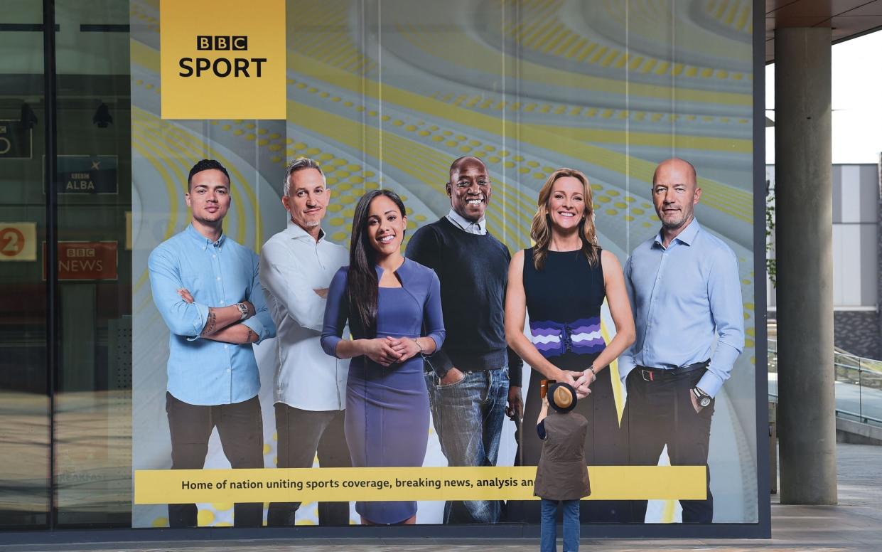 A poster showing the BBC Sport presenters and pundits (left to right) Jermaine Jenas, Gary Lineker, Alex Scott, Ian Wright, Gabby Logan and Alan Shearer at the BBC studios in Salford, Greater Manchester, in 2019