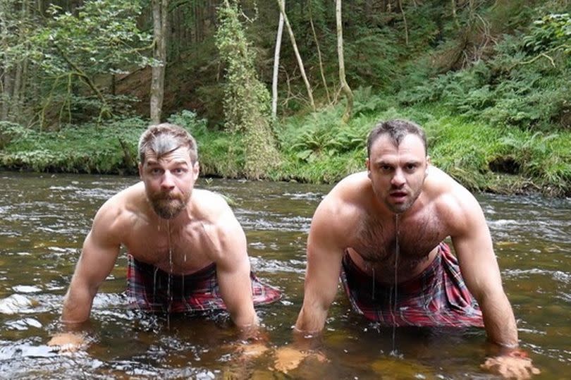 The pair went for some push ups in a freezing river