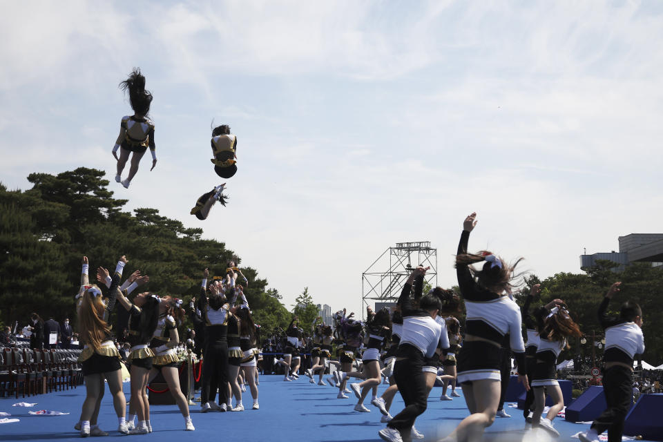 Students perform before the inauguration ceremony for South Korea's new President Yoon Suk Yeol at the National Assembly in Seoul, South Korea, Tuesday, May 10, 2022. (Kim Hong-ji/Pool Photo via AP)