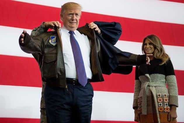 Trump receives a bomber jacket from the U.S. Pacific Air Forces in 2017. (Photo: AFP Contributor via Getty Images)