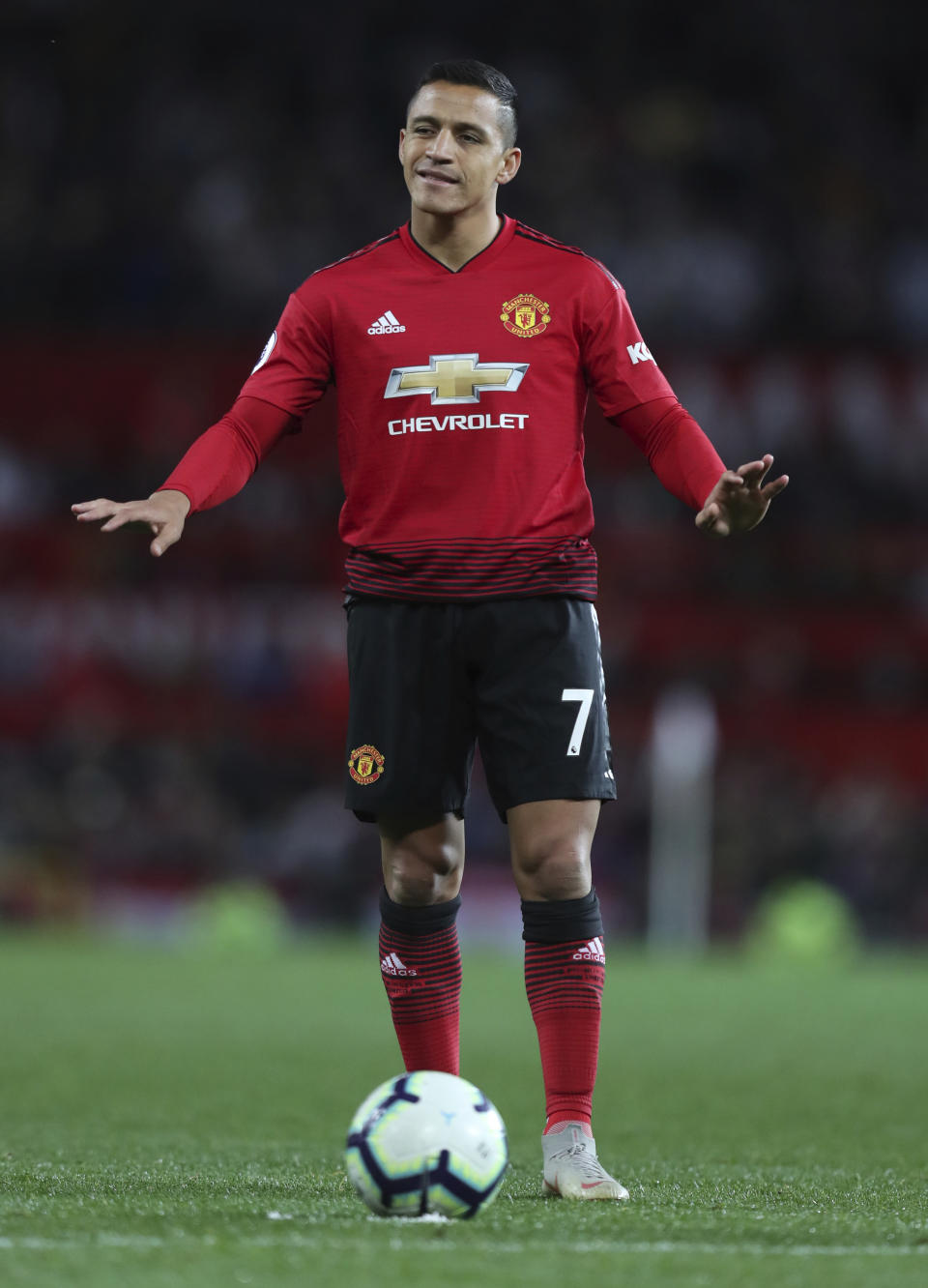 Manchester United's Alexis Sanchez gestures to his teammates during their English Premier League soccer match between Manchester United and Newcastle United at Old Trafford in Manchester, England, Saturday, Oct. 6, 2018. (AP Photo/Jon Super)