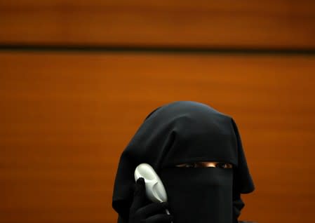 South African Yumna Desai listens as she attends a side event called "Silencing Dissident" during the Human Rights Council at the United Nations in Geneva