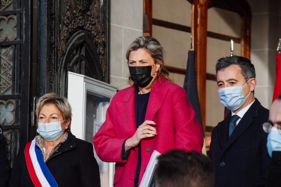 Annelies Verlinden, Belgium Interior Minister, is welcomed by Gerald Darmanin, French Interior Minister and Natacha Bouchart, Calais Mayor, on Sunday (Getty Images)